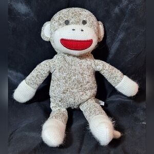 MAGIC YEARS Sock Monkey Toy with Enclosed Rattle
